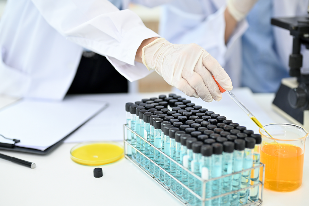 Scientist Running A Test With Chemicals