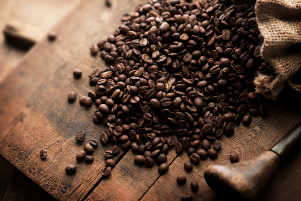 Coffee Beans On A Wooden Board